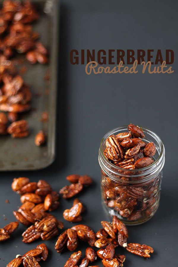 These gingerbread glazed roasted nuts use the traditional sweet and spicy flavour of gingerbread men to give a treat perfect for holiday parties or gifts via @ExSloth | ExSloth.com #Christmas