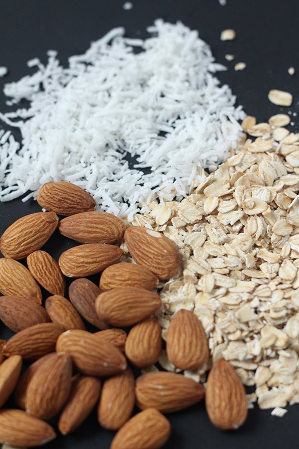 This coconut almond granola is easy to make, ready in under 30 minutes and full of delicious flavour. Plus, it's vegan, gluten free and refined sugar free via @ExSloth | ExSloth.com