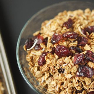 This slightly tart, mostly sweet Coconut Cranberry Orange Granola is gluten-free, vegan and ridiculously easy to make via @ExSloth | ExSloth.com