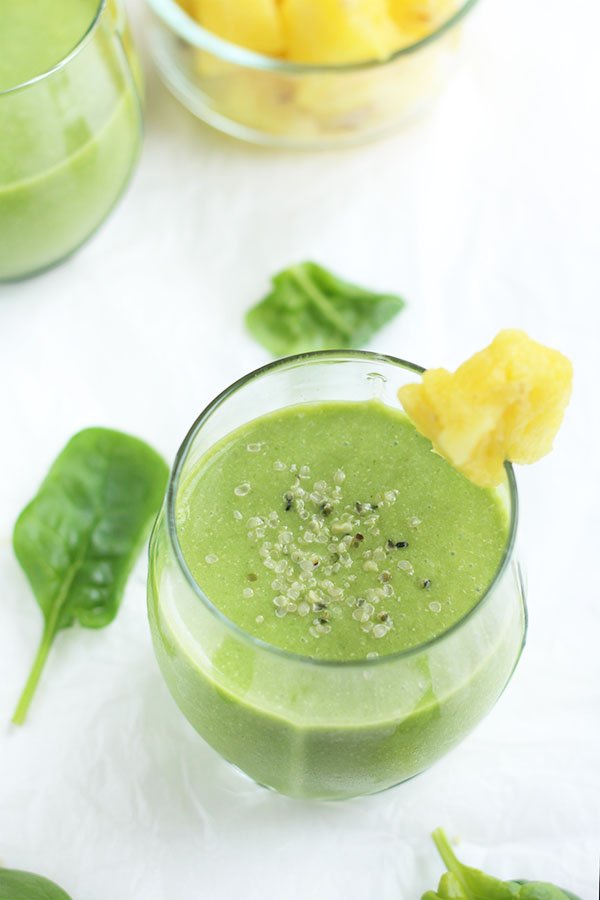 This pineapple quinoa green smoothie is creamy, refreshing, filling and packs a protein punch. Perfect for breakfast. via @ExSloth | ExSloth.com