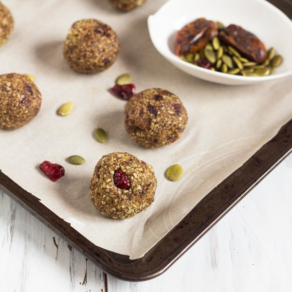 Vegan, Gluten Free & Nut Free Cranberry Pumpkin Seed Energy Balls via @ExSloth | ExSloth.com