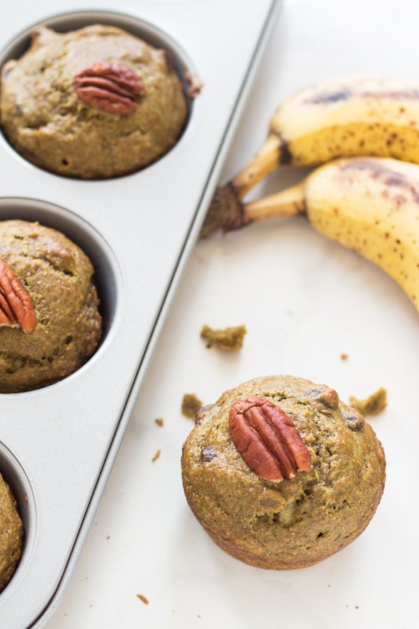 These Green Eggless Banana Muffins are also vegan, dairy-free, refined sugar-free and filled with spinach. Plus they use spelt flour instead of traditional wheat via @ExSloth | ExSloth