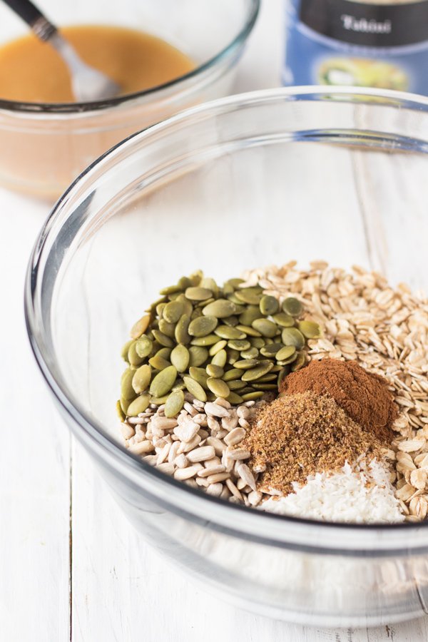 This Vegan Coconut Maple Tahini Granola is crunchy, satisfying and the perfect balance of sweet and savoury. Plus, it'll be ready in under 30 minutes. @ExSloth | ExSloth.com