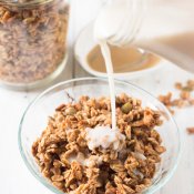 This Vegan Coconut Maple Tahini Granola is crunchy, satisfying and the perfect balance of sweet and savoury. Plus, it'll be ready in under 30 minutes. @ExSloth | ExSloth.com