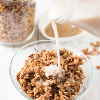 This Vegan Coconut Maple Tahini Granola is crunchy, satisfying and the perfect balance of sweet and savoury. Plus, it'll be ready in under 30 minutes. @ExSloth | ExSloth.com