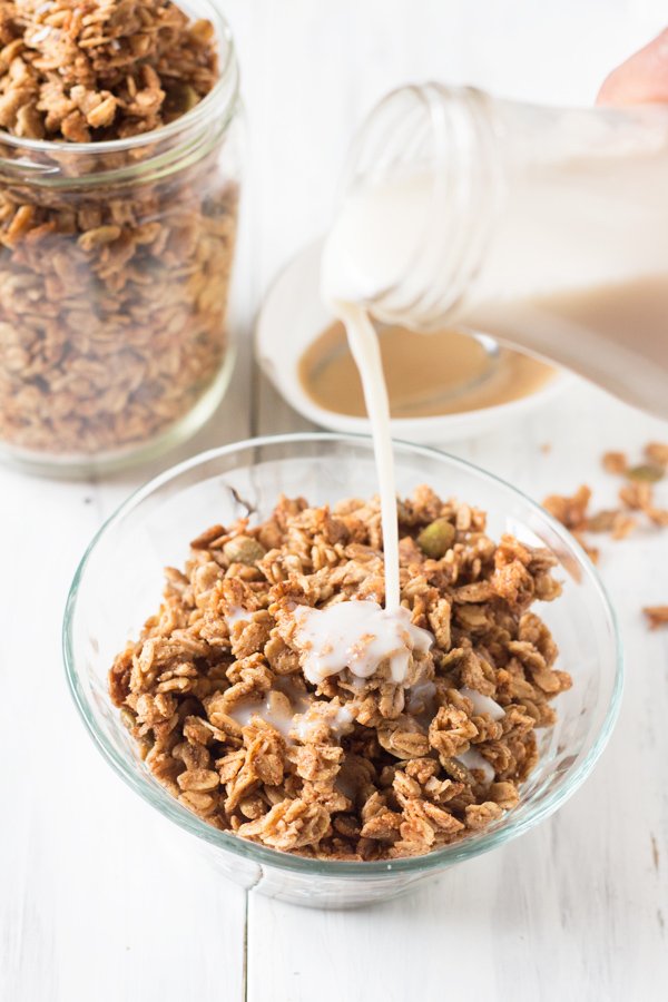 This Vegan Coconut Maple Tahini Granola is crunchy, satisfying and the perfect balance of sweet and savoury. Plus, it'll be ready in under 30 minutes. @ExSloth | ExSloth.com