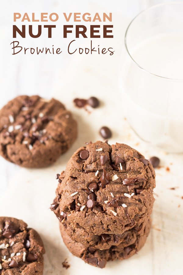 These vegan brownie cookies have a light crust/crunch on the outside but are soft, chewy and basically brownie-like on the inside. Plus, they're made with coconut flour and sunflower seed butter so they're gluten-free, nut-free and paleo via @ExSloth | ExSloth.com