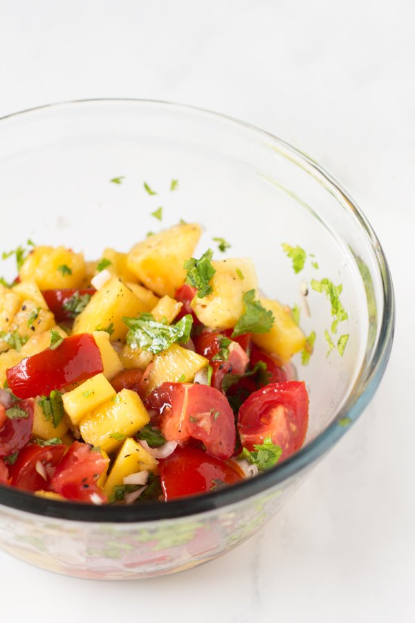 These vegan breakfast tacos are filling and flavourful, especially when topped with this super simple mango pineapple salsa via @ExSloth | ExSloth.com