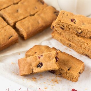 Crunchy Vegan Cranberry Orange Oatmeal Cookie Bars that are sweet and tart and perfect for a healthy afternoon snack via @ExSloth | ExSloth.com