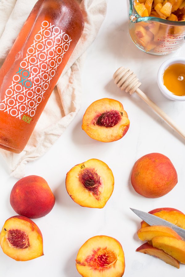 This creamy vegan peach rosé sorbet is perfectly sweet with a slight kick and doesn't require an ice cream maker via @ExSloth | ExSloth.com