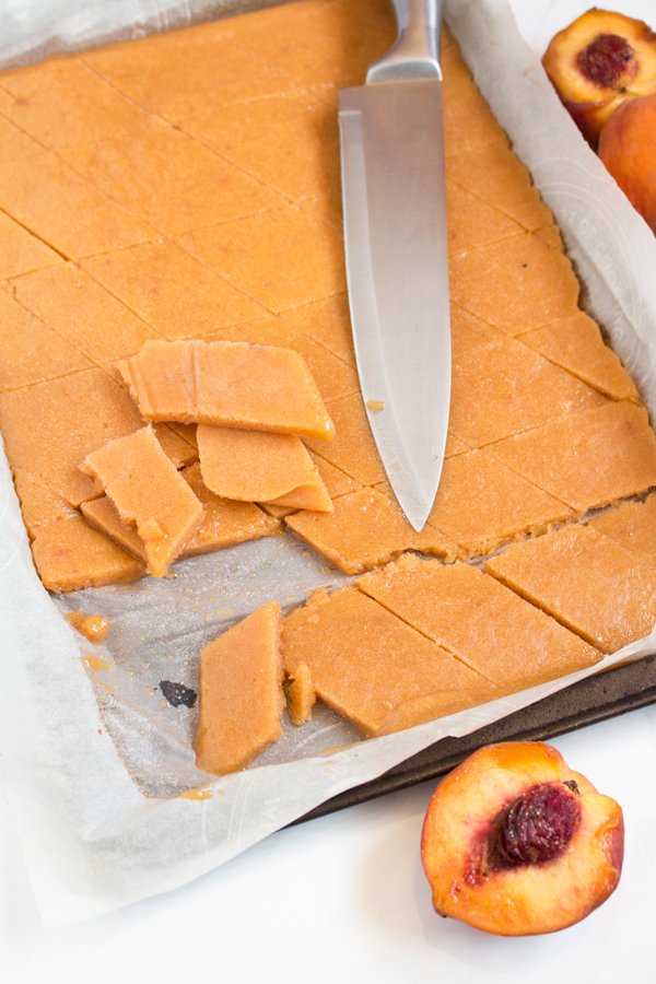 This creamy vegan peach rosé sorbet is perfectly sweet with a slight kick and doesn't require an ice cream maker via @ExSloth | ExSloth.com