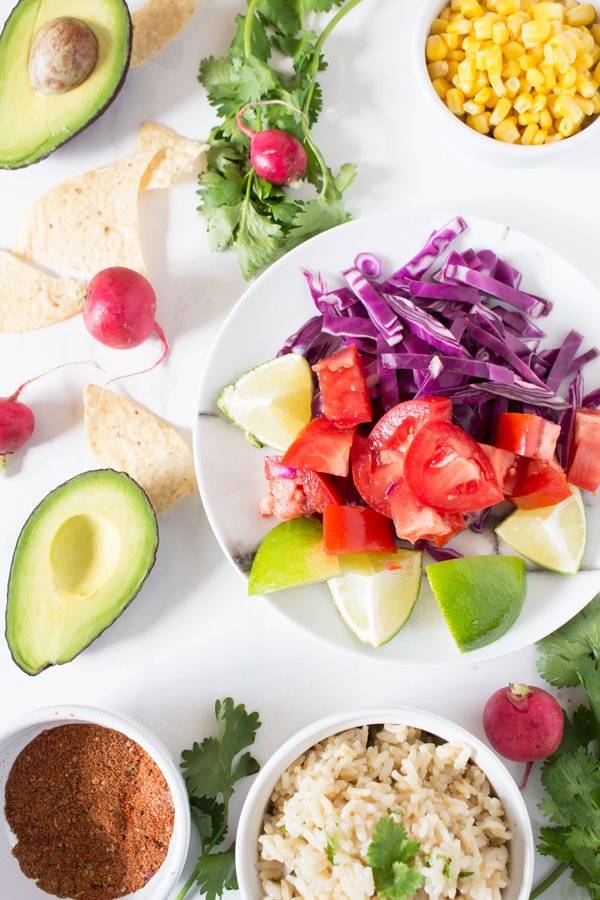 This vegan, gluten-free chickpea taco buddha bowl is subtly spiced, packed with flavour and unbelievably satisfying via @ExSloth | ExSloth.com