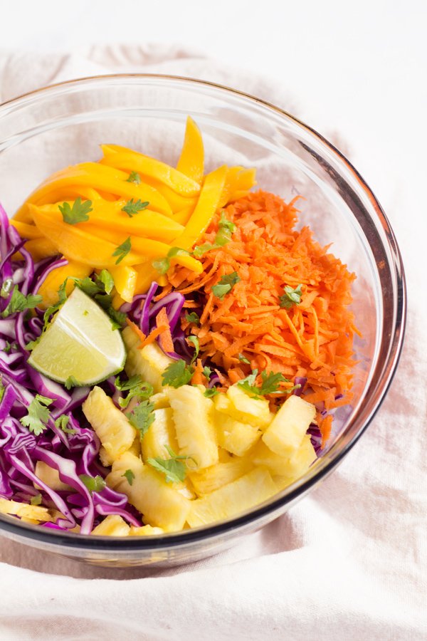 Easy Red Cabbage Tropical Mango Pineapple Slaw (adapted from the classic Caribbean coleslaw) Vegan, Gluten-Free via @ExSloth | ExSloth.com
