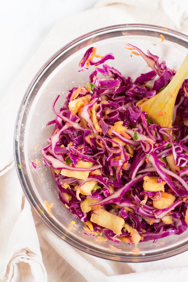 Easy Red Cabbage Tropical Mango Pineapple Slaw (adapted from the classic Caribbean coleslaw) Vegan, Gluten-Free via @ExSloth | ExSloth.com