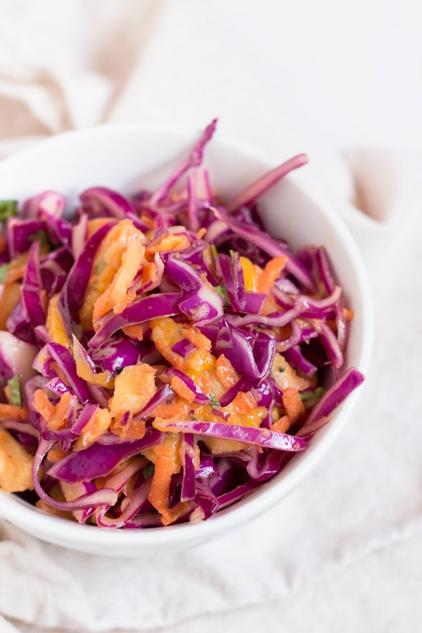 Easy Red Cabbage Tropical Mango Pineapple Slaw (adapted from the classic Caribbean coleslaw) Vegan, Gluten-Free via @ExSloth | ExSloth.com