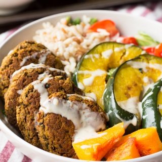 This 30 minute pumpkin falafel buddha bowl is bursting with fall flavour, fibre and lots of plant-based goodness via ExSloth.com