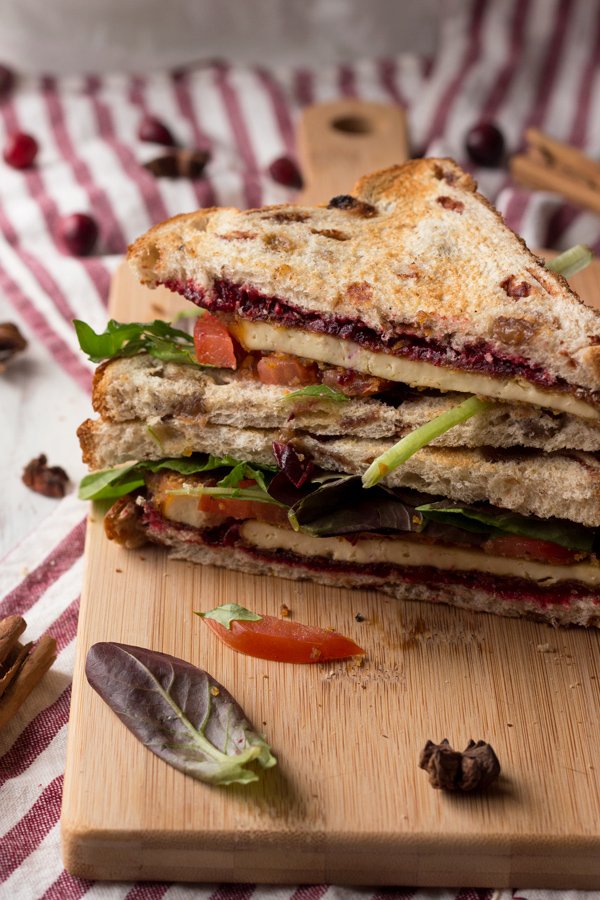 Crispy pan fried tofu with chai cranberry sauce (a vegan version of the classic Christmas or Thanksgiving leftovers sandwich) via ExSloth.com