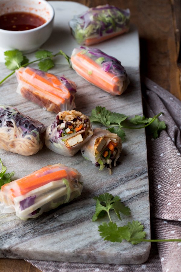 These baked rice paper rolls are hearty, flavourful , slightly crispy and perfectly sweet and spicy. A great gluten-free and vegan alternative to traditional spring rolls. via ExSloth.com