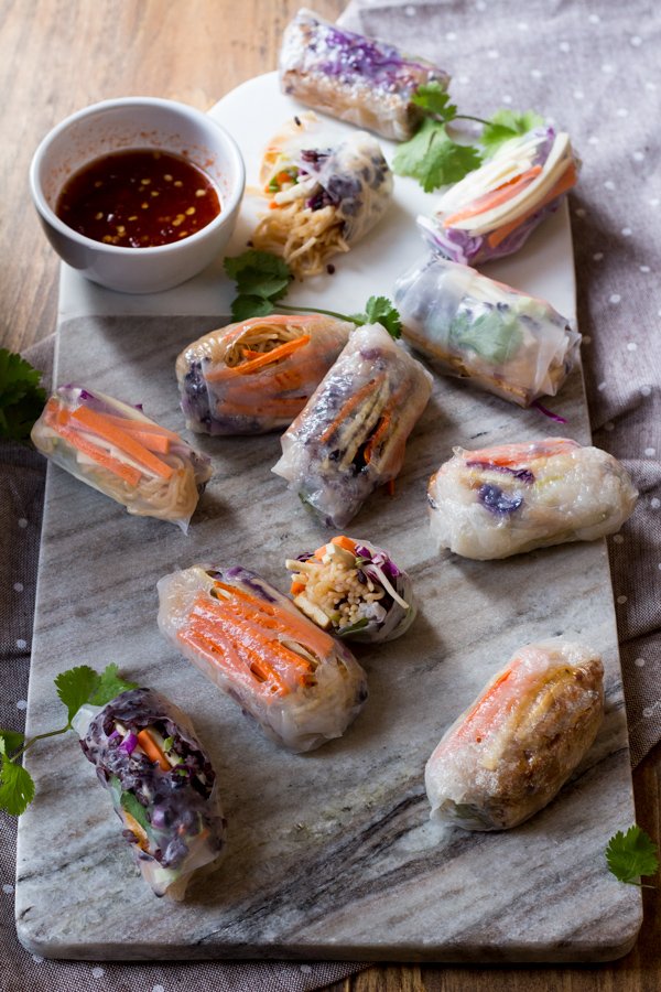 These baked rice paper rolls are hearty, flavourful , slightly crispy and perfectly sweet and spicy. A great gluten-free and vegan alternative to traditional spring rolls. via ExSloth.com