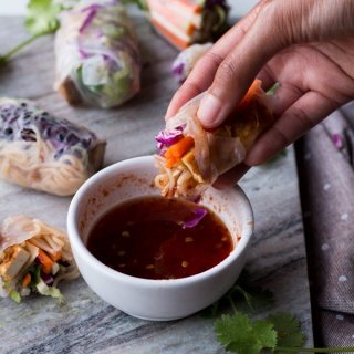These baked rice paper rolls are hearty, flavourful , slightly crispy and perfectly sweet and spicy. A great gluten-free and vegan alternative to traditional spring rolls. via ExSloth.com