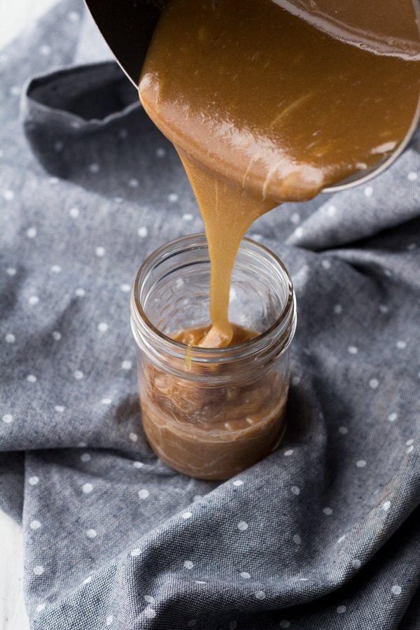 This tahini-based 5 ingredient vegan salted caramel sauce is smooth, creamy and perfect for drizzling. (Dairy free, paleo friendly and refined sugar free) via ExSloth.com