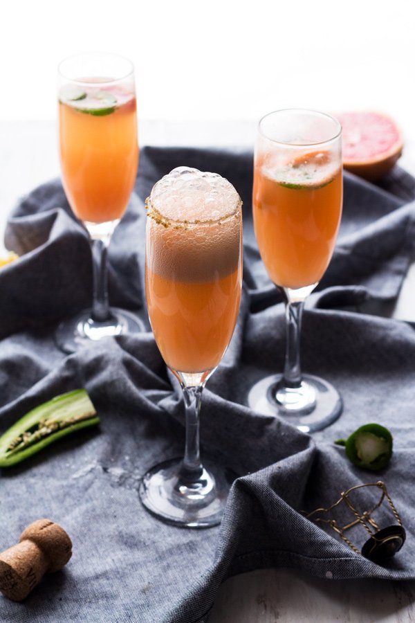 5 Ingredient Spicy Grapefruit Mimosa - perfect for everything from New Year's Eve brunch to Mother's Day via ExSloth.com