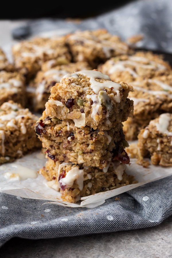 These coconut chai quinoa breakfast bars are vegan, gluten-free, refined sugar-free, filled with plant-based protein and can be made nut free depending on the mix-ins you use. They also make a great grab-and-go vegan breakfast | ExSloth.com