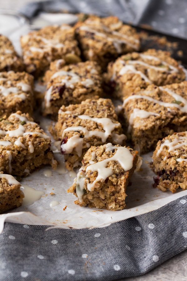 These coconut chai quinoa breakfast bars are vegan, gluten-free, refined sugar-free, filled with plant-based protein and can be made nut free depending on the mix-ins you use. They also make a great grab-and-go vegan breakfast | ExSloth.com