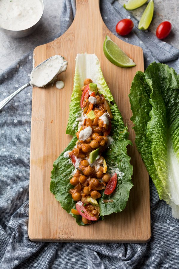 These BBQ chickpea lettuce wraps with vegan ranch dressing are bursting with sweet and smokey bbq flavour and make great light and easy vegan lunches | ExSloth.com