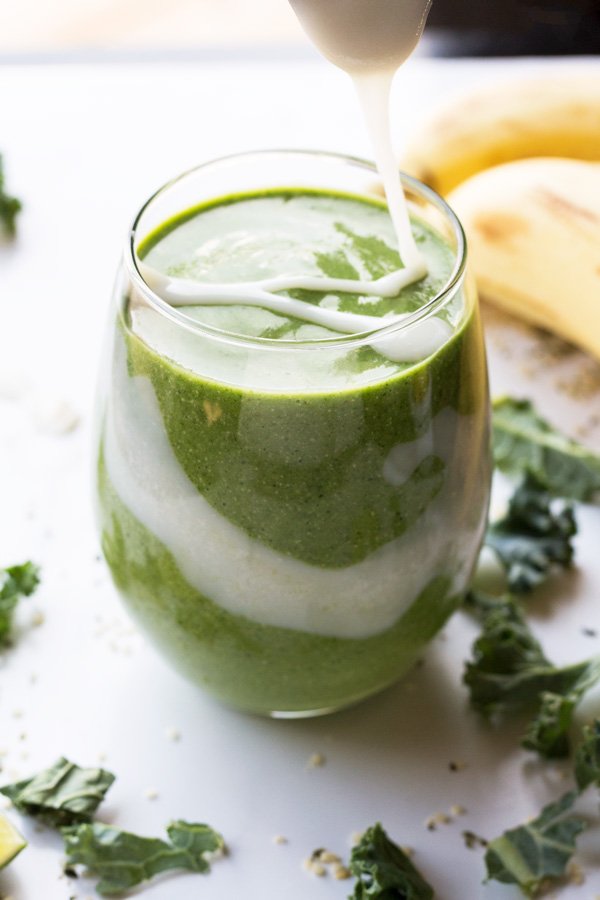 This tropical ginger hemp seed smoothie is easy to throw together, portable, delicious and it's filled with plant-based protein thanks to the hemp seeds | ExSloth.com