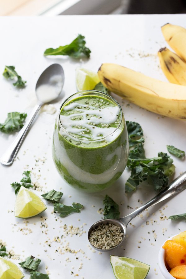 This tropical ginger hemp seed smoothie is easy to throw together, portable, delicious and it's filled with plant-based protein thanks to the hemp seeds | ExSloth.com