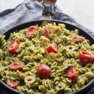 This easy vegan cilantro pesto pasta is flavourful, spicy, filling and calls for just 10 ingredients and about 25 minutes. Perfect vegan lunch or dinner | ExSloth.com