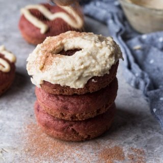 These vegan red velvet donuts are a delicious, healthy alternative to regular fried donuts and are great for Valentine's Day. The vegan cashew cream cheese frosting is also easy to make, creamy and perfectly sweet | ExSloth.com